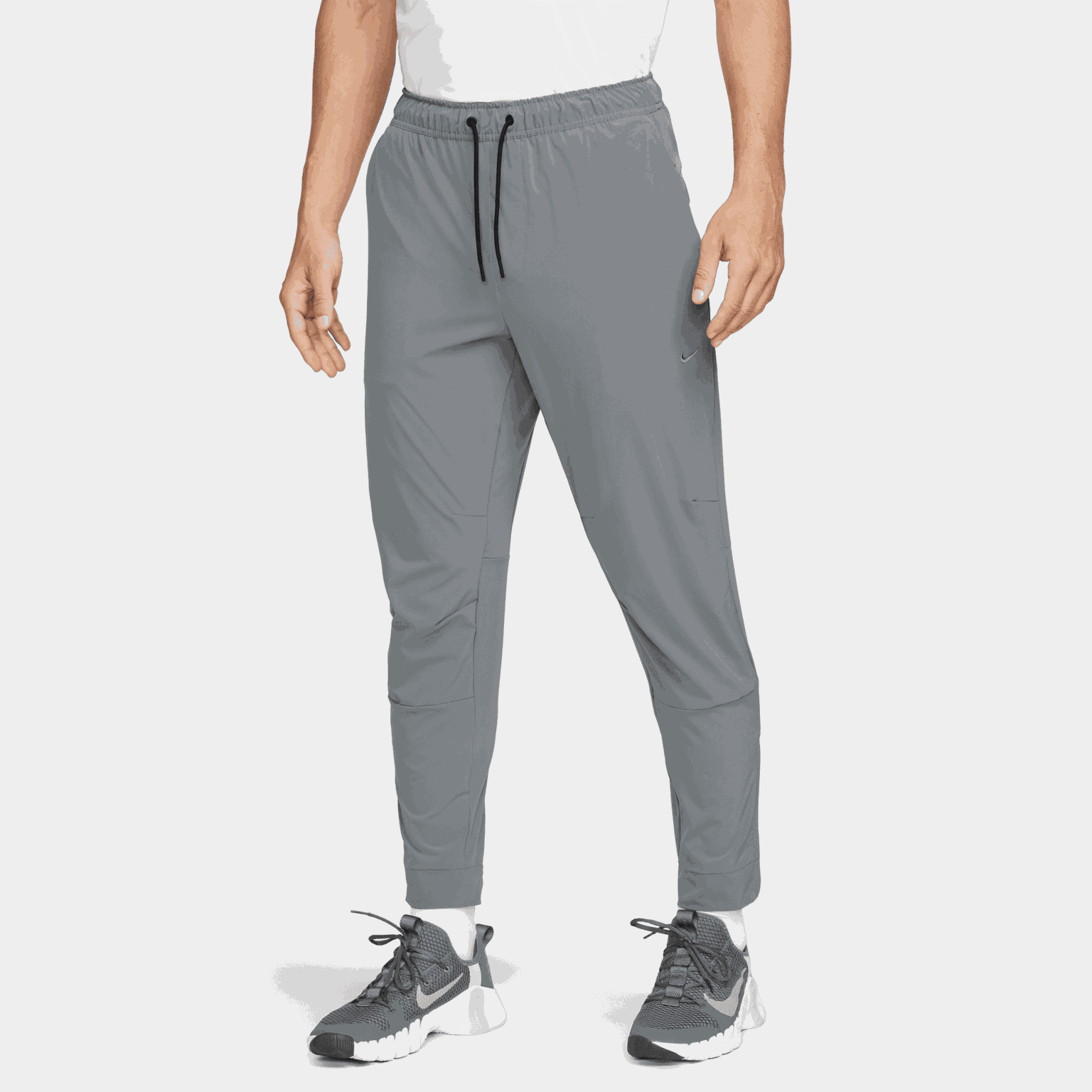 Dri-FIT Unlimited Pant Tapered, miesten treenihousut - full image 1